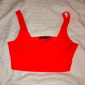 Neon orange crop top.
